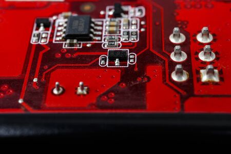 Graphic card. Part of red graphic card as background. Technology and Electronics Industry. Macro.の写真素材