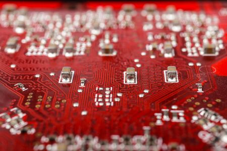 Graphic card. Part of red graphic card as background. Technology and Electronics Industry. Macro.の写真素材