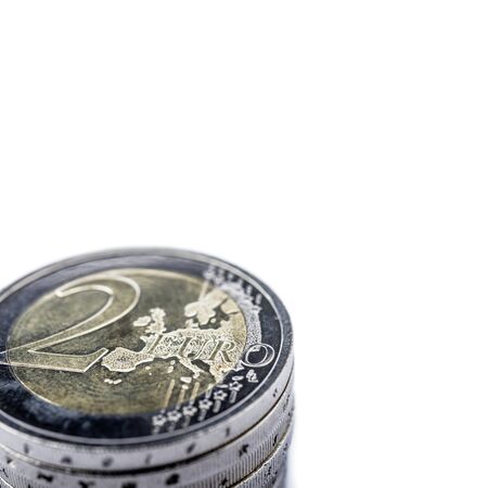 Pile of euro coins isolated on white background. Stack of euro coins. Save money and accumulate...