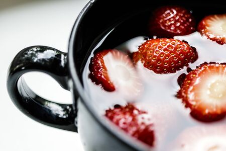 Strawberries are in a cup. Natural strawberry. Macro.の写真素材