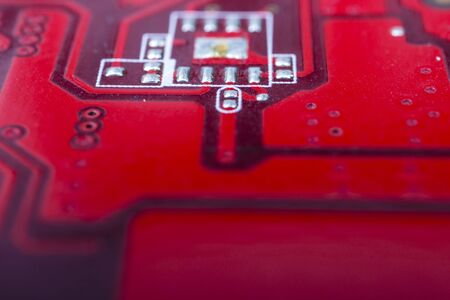 Graphic card. Part of red graphic card as background. Technology and Electronics Industry. Macro.