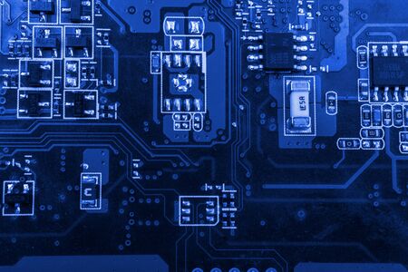 Graphic card. Part of red graphic card as background. Technology and Electronics Industry. Macro.