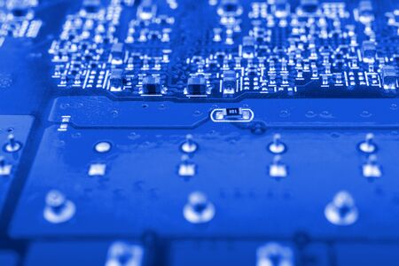 Graphic card. Part of red graphic card as background. Technology and Electronics Industry. Macro.