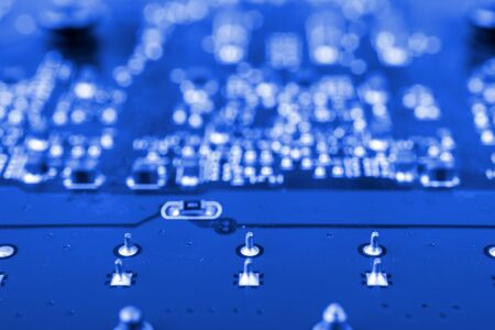 Graphic card. Part of red graphic card as background. Technology and Electronics Industry. Macro.