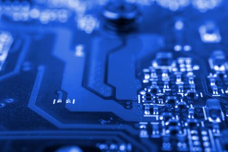 Graphic card. Part of red graphic card as background. Technology and Electronics Industry. Macro.