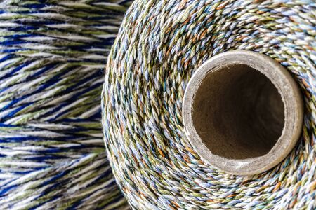 Colourful thread spool. Spool of thread. Thread texture.の写真素材