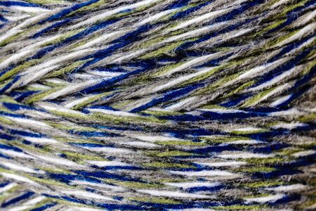Colourful thread spool. Spool of thread. Thread texture.