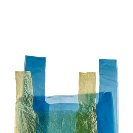 Yellow and blue plastic bag isolated on white background.の写真素材