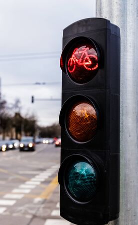 Traffic light for cyclists. Red light for bycicle lane on a traffic light. Traffic light in red for...