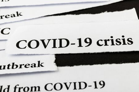 Coronavirus breaking news headline clippings from various newspapers reporting on the deadly...