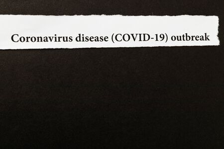 Coronavirus breaking news headline clipping from newspaper. Coronavirus outbreak and COVID-19 crisis...