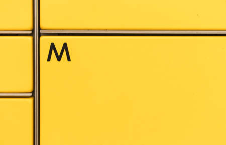 Post office box. Yellow post box for rentals. Post box lockers for parcels that the recipient can pick up there. Pack station.の写真素材