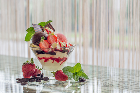 Delicious strawberry dessert with mint and chocolateの写真素材