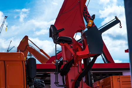 Crane operator working place. Heavy industry chair.