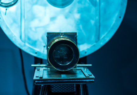 Old style movie camera with close up, vintage photo effectの写真素材