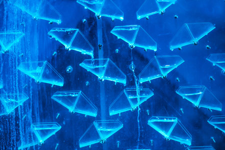 Flask containing chemical liquid with lab backgroundの写真素材