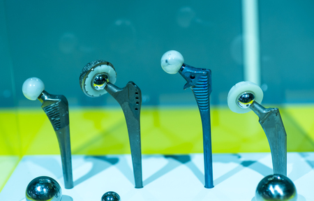 Machinery concept. Set of various gears and ball bearings on dark backgroundの写真素材