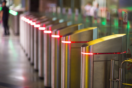 Glowing Turnstiles on an entrance to the subwayの写真素材