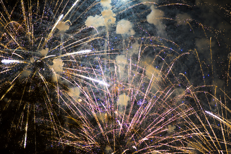 Salute in the night sky. Bright texture of festive fireworks. Abstract holiday background with...