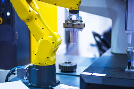 Augmented reality for industry concept. Robotic and Automation system control application on automate robot arm in smart manufacturing background.の写真素材