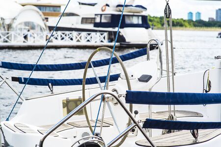steering wheel on a luxury yacht cabin.