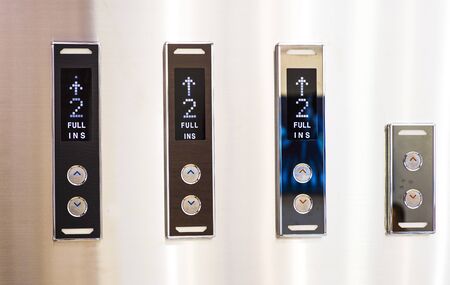 Different buttons in modern metal elevator