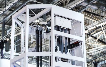 Glass elevator ,Businessman taking modern glass elevator to the upper floors, high building ,office...