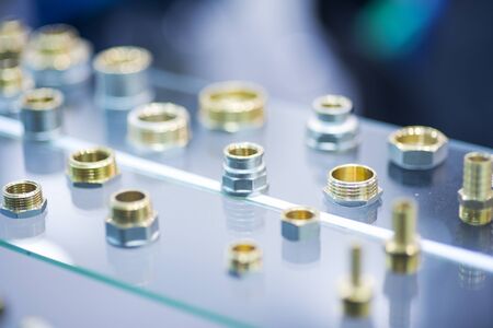 spare parts and tools lying on drawing for a repair plumbingの写真素材