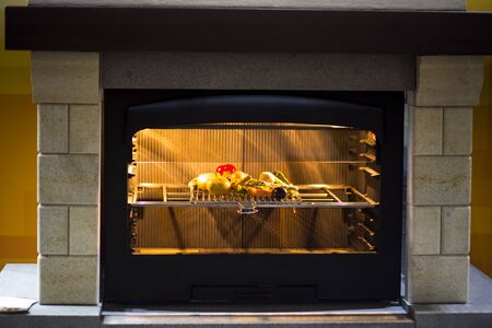 picture of cooking in a stone ovenの写真素材