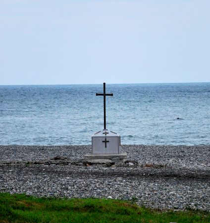 The cross on the beach, in remembrance of the monument.の写真素材