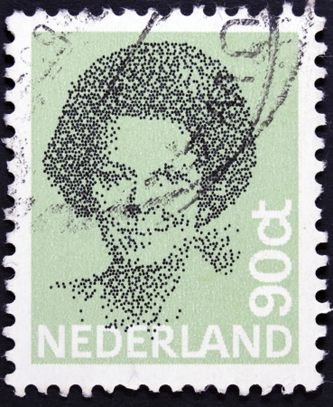 NETHERLANDS - CIRCA 1982  A stamp printed in Netherlands shows portrait of Queen Beatrix regnant of the Kingdom of the Netherlands, circa 1982 の写真素材