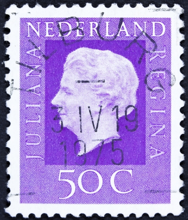 NETHERLANDS - CIRCA 1969  A stamp printed in Netherlands shows portrait of Queen regnant of Netherlands Juliana with the inscription  Juliana regina , from the series  Queen Juliana , circa 1969 の写真素材