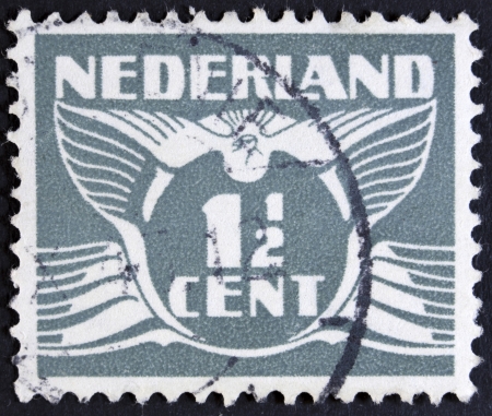 NETHERLANDS - CIRCA 1941  A 1 1 2 cent stamp printed in the Netherlands, circa 1941  の写真素材