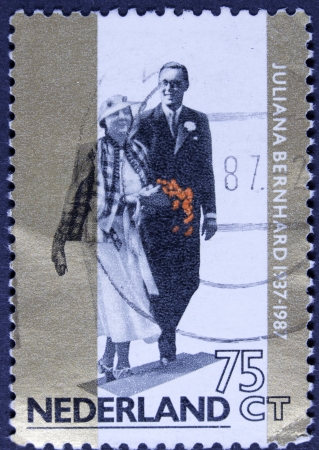 HOLLAND -CIRCA 1987  Stamp printed in the Netherlands for the golden jubilee of the wedding of Queen Juliana with Prince Bernhard von Lippe Biesterfeld in 1937, circa 1987 のeditorial素材