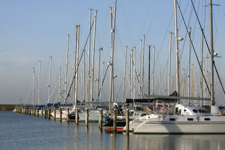 ANDIJK , THE NETHERLANDS - 12 JANUARY : Sailboats in the marina on january 12,2014 in Andijk, The...
