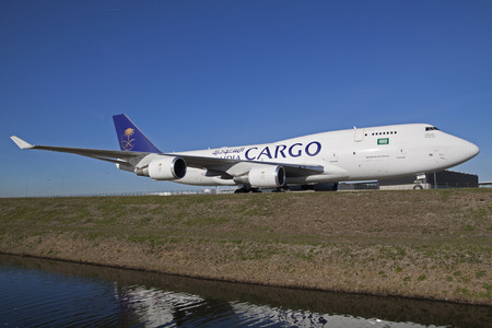 Amsterdam, the Netherlands - March 11, 2015: Large white Boeing 747 cargo freighter saudia That Has Just landed with a beautiful blue sky.のeditorial素材