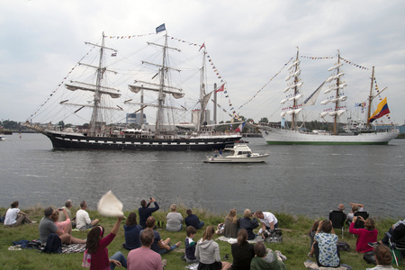 The Netherlands - August 23, 2015: Visitors watch the tall ships departing after four days of the great nautical event in 2015 in Amsterdam constantly sail sail in 2015のeditorial素材