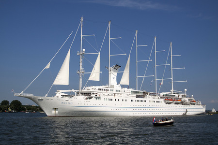 AMSTERDAM, THE NETHERLANDS, 20 AUGUST 2015: Cruisship The Wind Surf Bahamas modern sailing anchored...