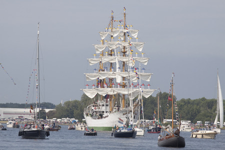 Port of Amsterdam, Noord-Holland, Netherlands - August 19, 2015: Sailors on the masts of the tall ship Arc Gloria from Colombia constantly sail in 2015のeditorial素材