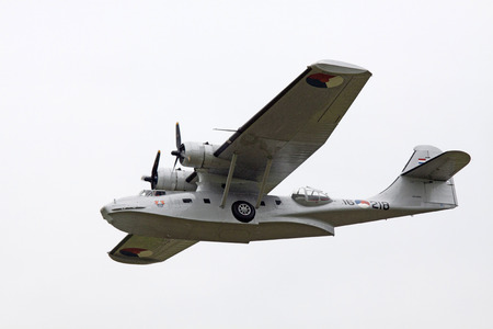 LEEUWARDEN, THE NETHERLANDS - JUNE 11 2016: Consolidated PBY Catalina flying colors in Dutch Navy at...