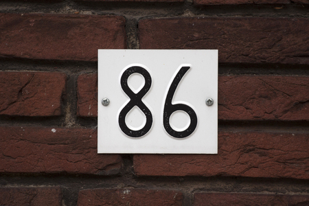 House number 86 in black and wihteの写真素材