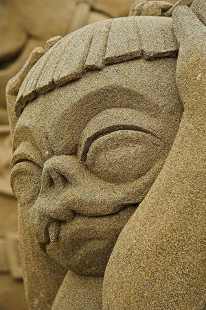 Sand sculpture with a worried lookの写真素材