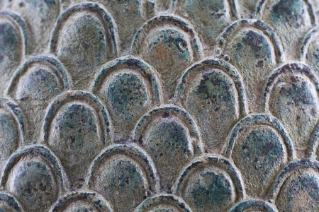 Closeup of metal fish scale sculptureの写真素材