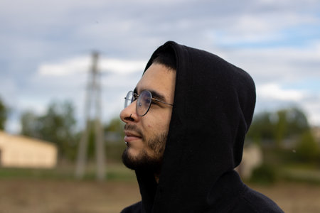 young man from side looking incredulousの写真素材
