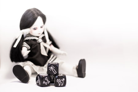 Living Dead Doll and Dices with symbolsの写真素材