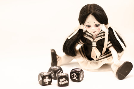 Living Dead Doll and Dices with symbolsの写真素材