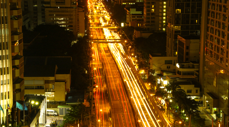 A busy road with tail lightsの写真素材