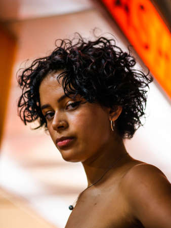 beautiful Brazilian female posing at the cameraの写真素材