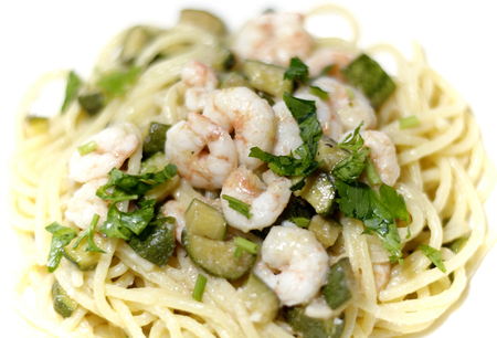 typical dish of Italian tradition shrimp spaghetti and zucchiniの写真素材