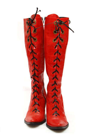 Pair of woman elegant red boots for autumn or springの写真素材
